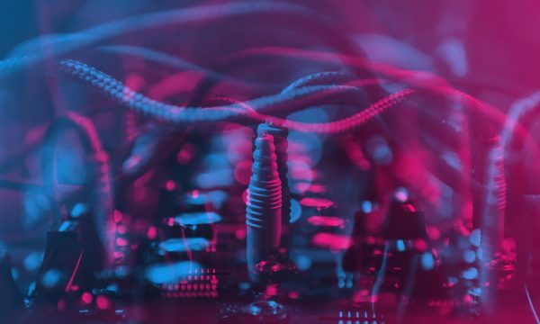 Synthesizer in nightclub.Synth deck with audio cables in bright Dj midi controller device for composing new music and sound effects at party.Produce digital musical tracks with synthesizer deck.Audio equipment edited with 3d stereo effect